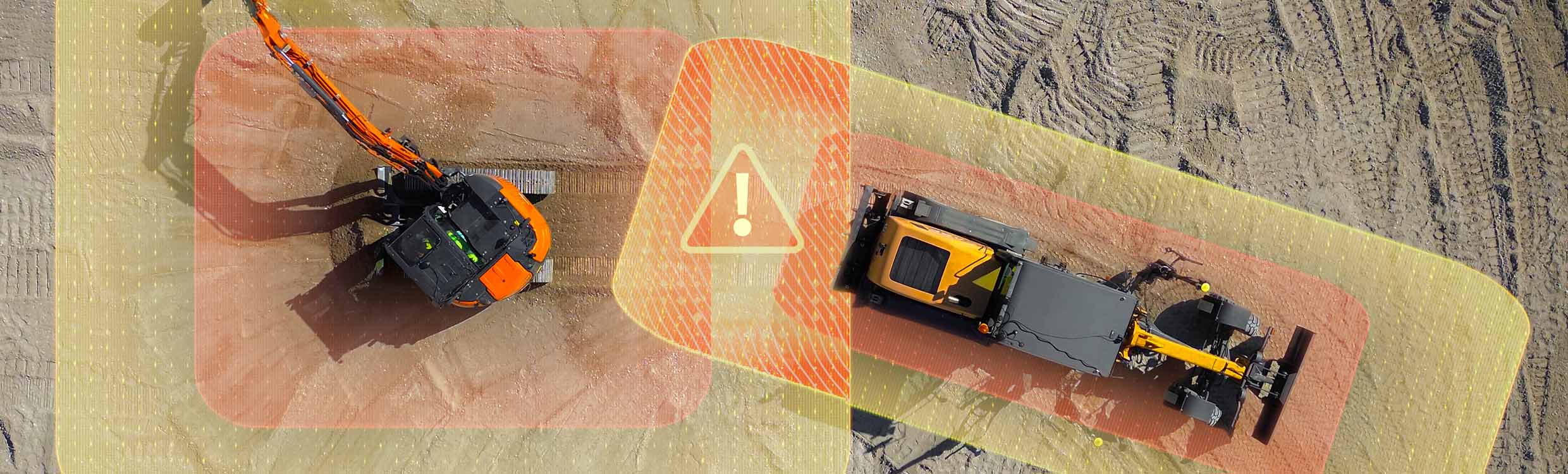 An excavator and a grader equipped with the Leica Xsight360 safety awareness solution that provides different safety zones to eliminate machine-to-machine collisions.